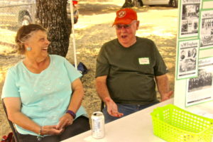 Wendy Black and Jerry Howard working the booth at Day in the Park 